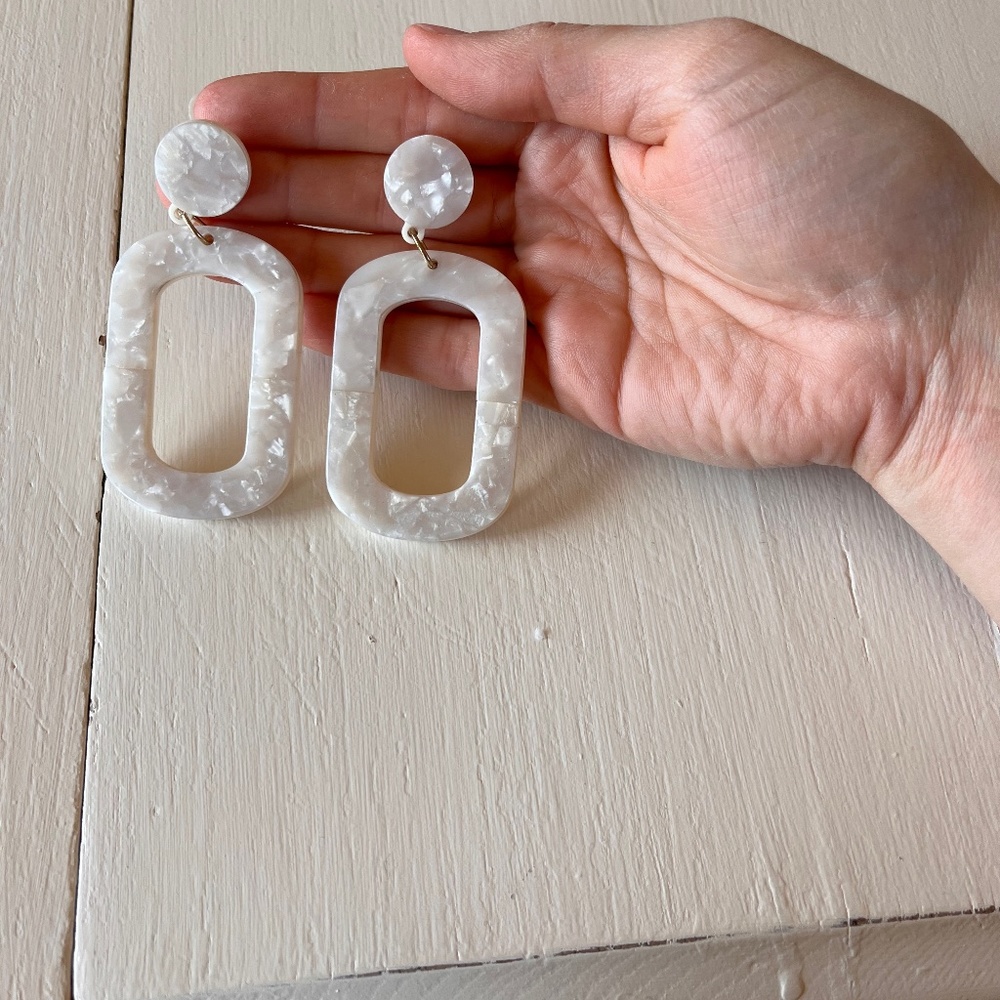 Dangling white earrings